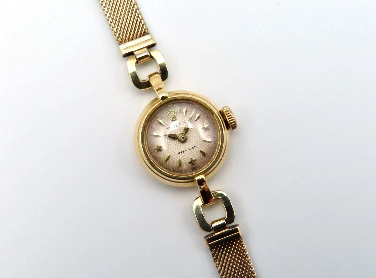 18k Gold Rolex Orchid Precision