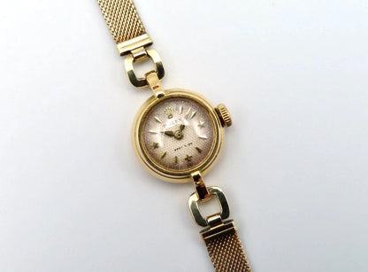 18k Gold Rolex Orchid Precision