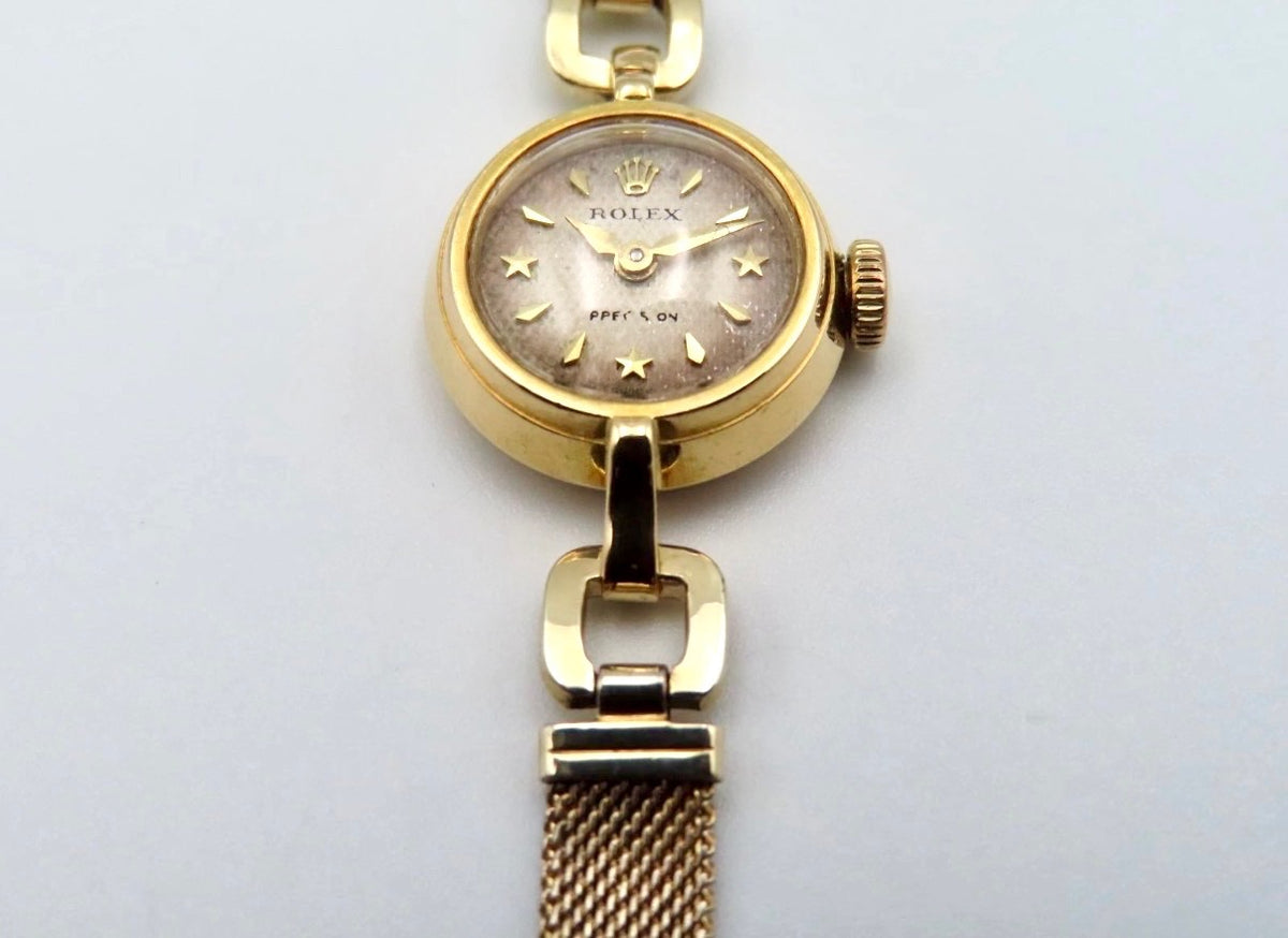 18k Gold Rolex Orchid Precision