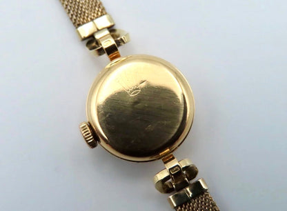 18k Gold Rolex Orchid Precision
